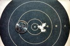 Target with holes from .22 bullets